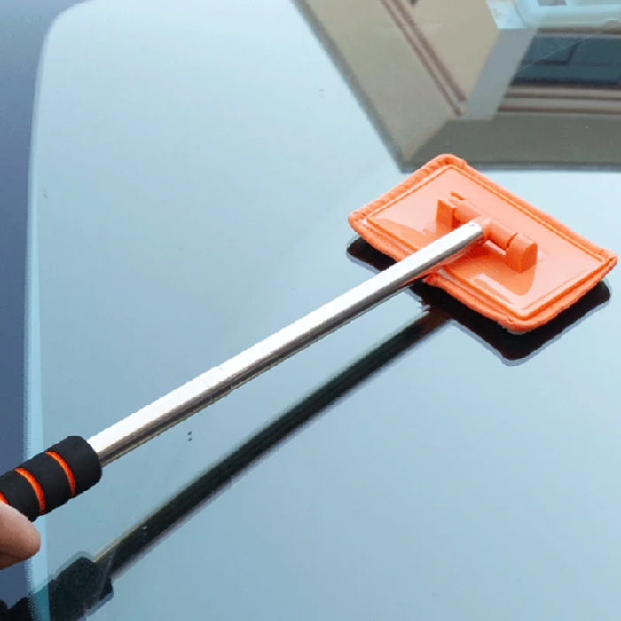 Telescopic wand cleaning inside a car windscreen